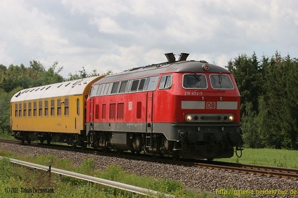 022 - 218 473 mit Funkmesswagen in der Heide - Einfahrt Hodenhagen